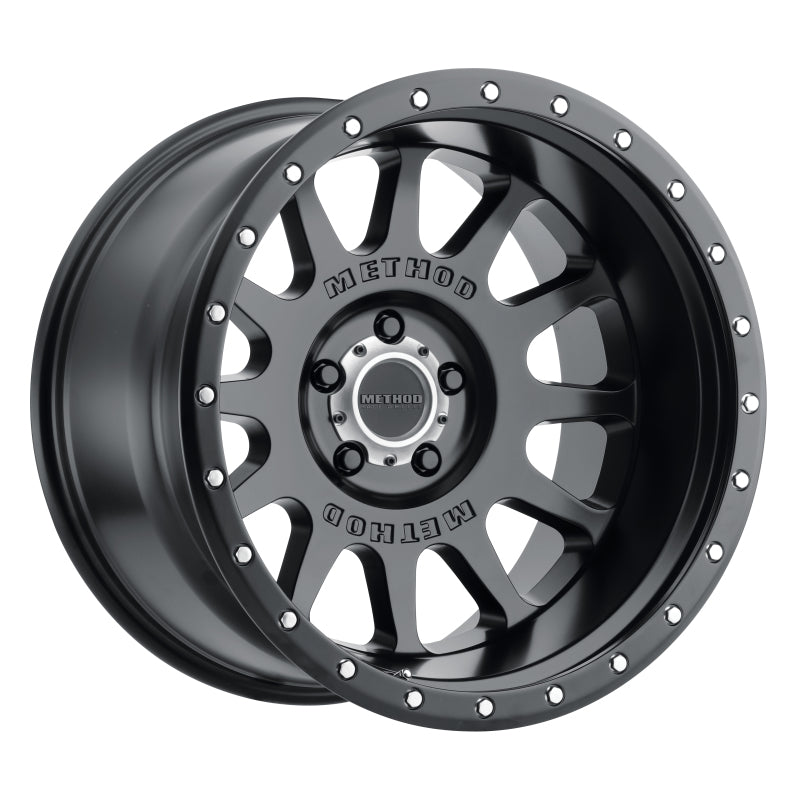 Method mr605 nv 20x10 matte black wheel with 24mm offset on white background