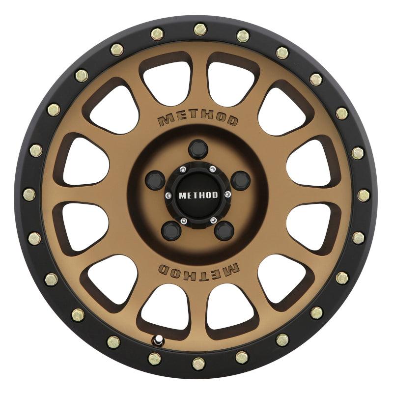Method mr305 nv 17x8.5 0mm offset 5x5 wheel black rim gold spokes