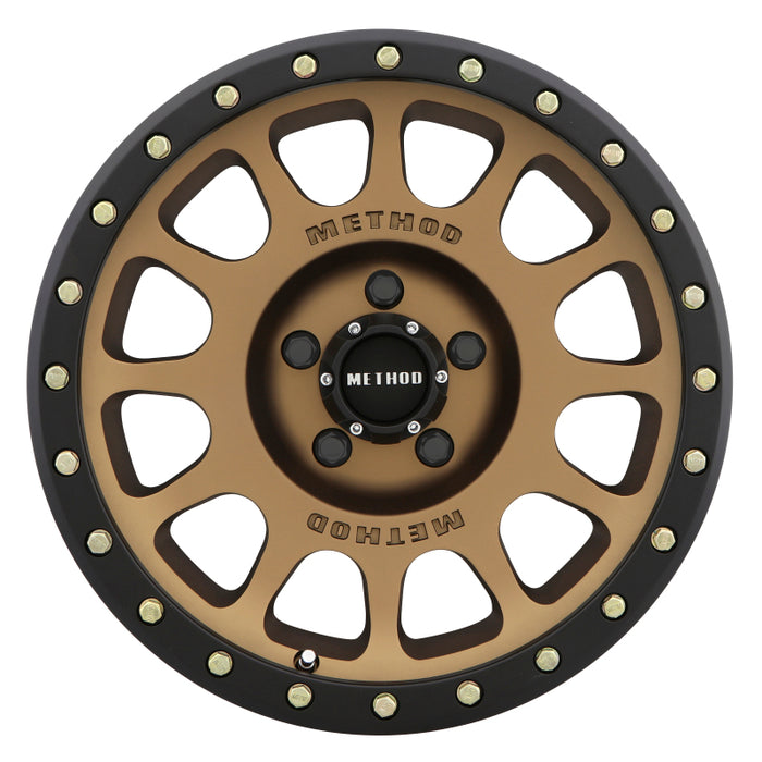 Method mr305 nv 20x9 +25mm offset 5x150 wheel with black rim and gold spokes