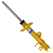Yellow shock absorber attached to white background for bilstein b6 jeep renegade 4wd.