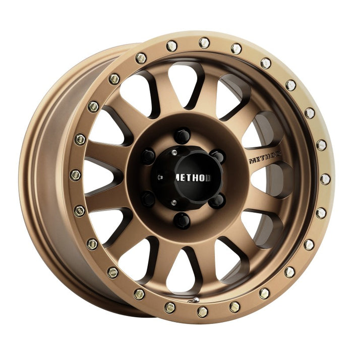 Method mr304 double standard 17x8.5 0mm offset wheel - gold and black truck front wheel