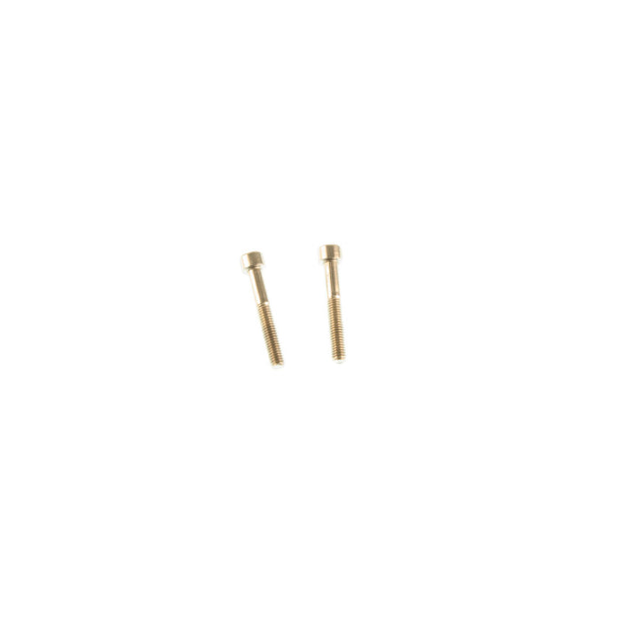 Gold earrings displayed on a product’s packaging.