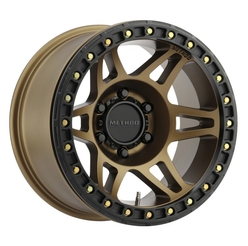 Method mr106 beadlock 17x9 -44mm offset wheel with black and gold finish