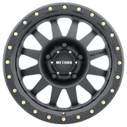 Method mr304 double standard 15x8 matte black wheel with gold rivets