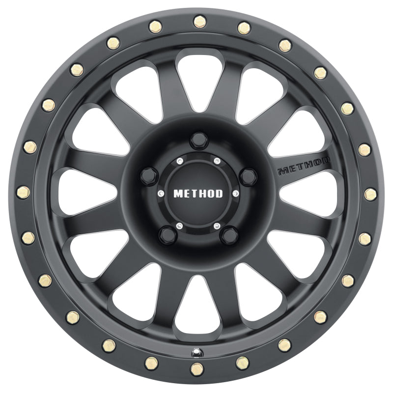 Method mr304 double standard 15x8 matte black wheel with gold rivets