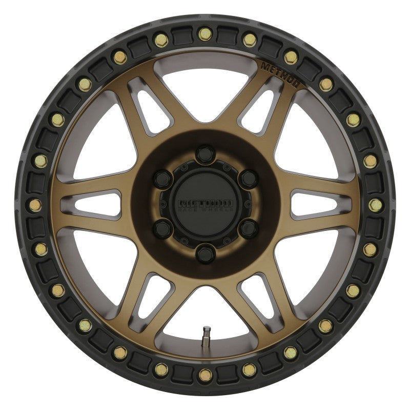Method mr106 beadlock 17x9 wheel with black and gold rim