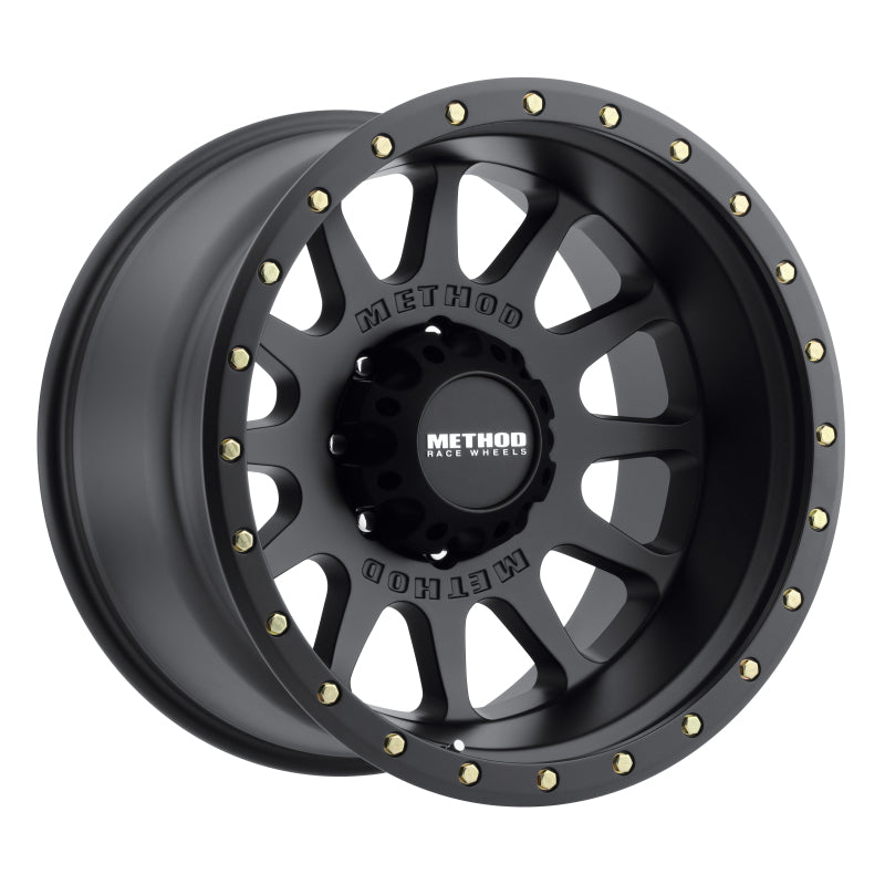 Method mr605 nv 20x10 matte black wheel with gold studs and black rim